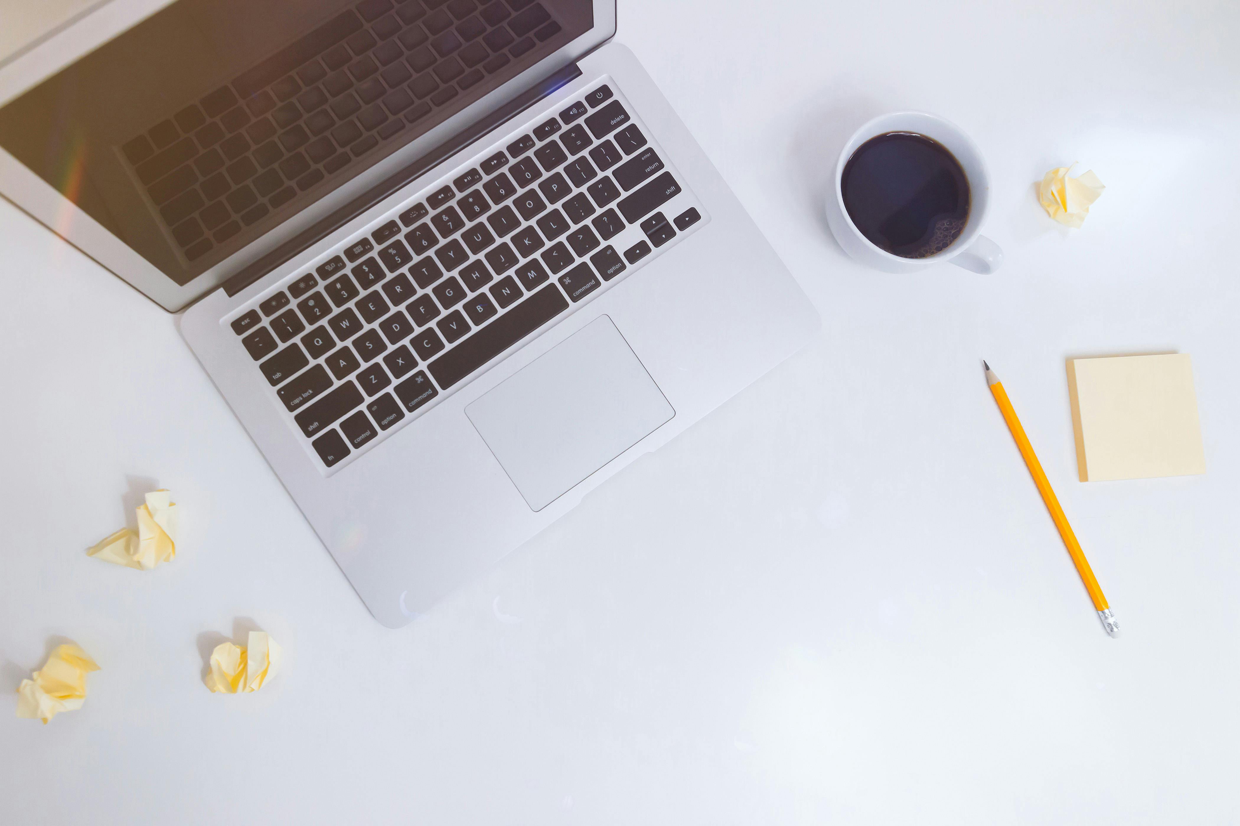 A professional working at a modern, clean desk with focus and clarity